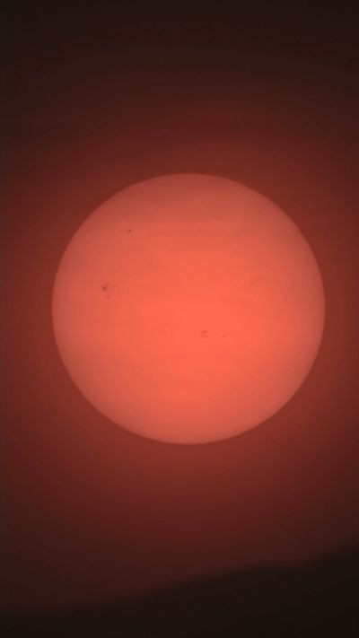 Солнце через облака