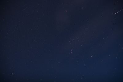 Орион с метеором и спутником