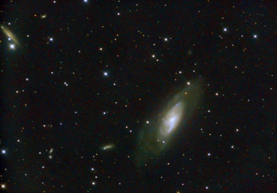 Galaxy M106 in the constellation Canes Venatici and other, smaller galaxies. - Astrophotography