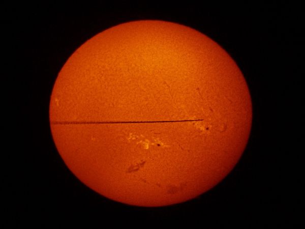 Hydrogen Sun and trace of the plane - Astrophotography