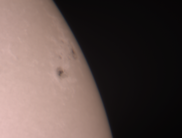 A group of sunspots at the limb of the solar disk. - Astrophotography
