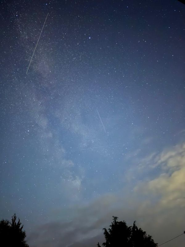 The milky way peeking out from behind the clouds - Astrophotography