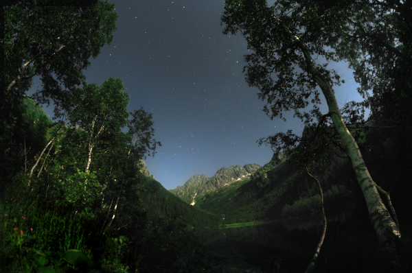 Starry night over Lake Kardyvach in the mountains. - Astrophotography