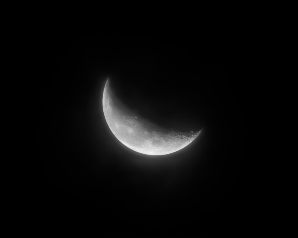 Aging moon with clouds in the frame - Astrophotography