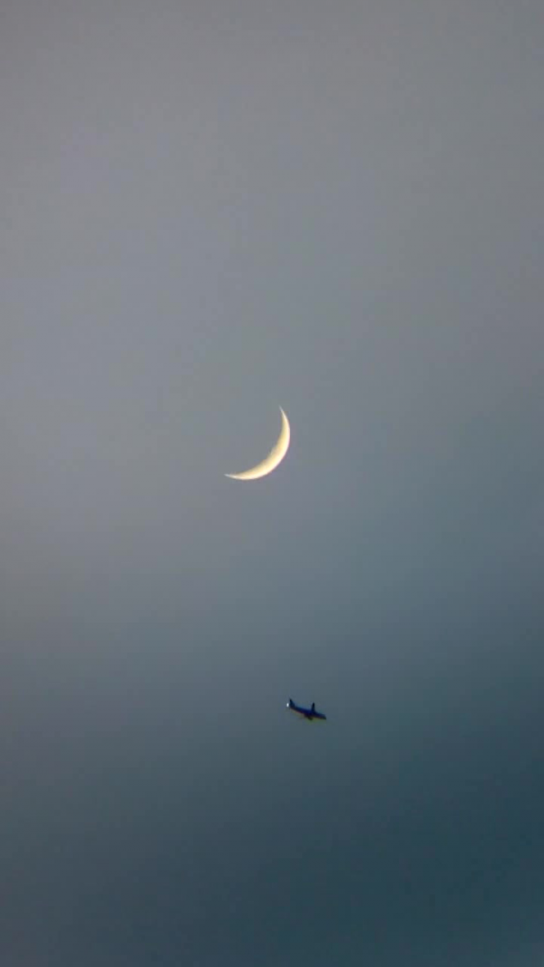 The Moon and an airplane. February 15, 2021 - Astrophotography