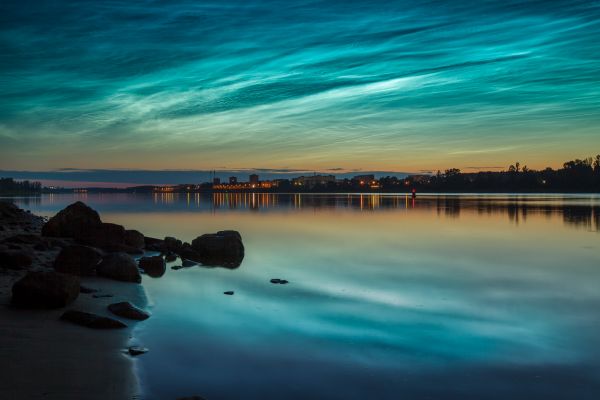 Noctilucent clouds over the Volga River. - Astrophotography