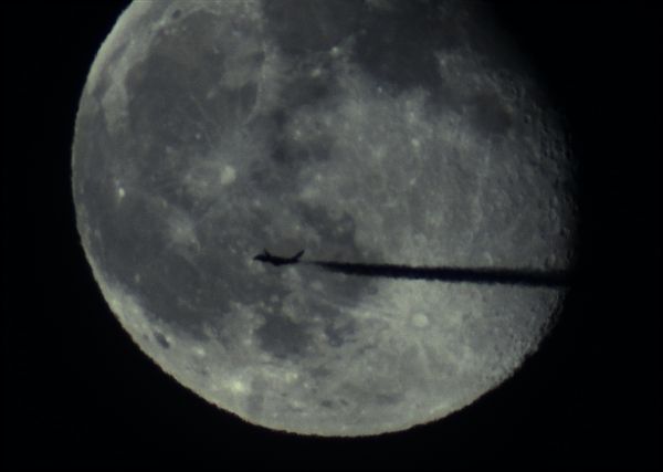 Airplane in front of the Moon - Astrophotography