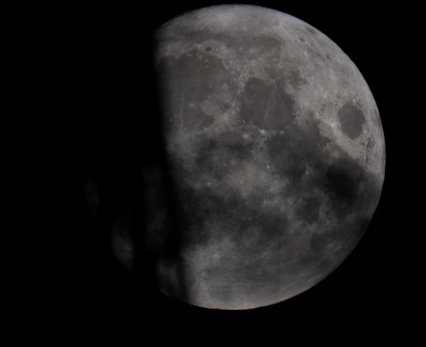 The Moon behind a power line support. September 9, 2022. - Astrophotography